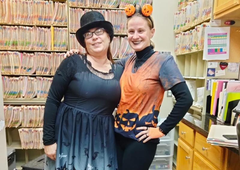 Carousel Slide 3: Lisa & Kristin show their spooky spirit!!